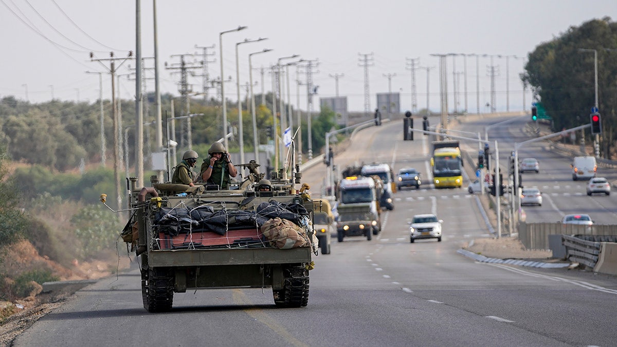 Israeli armored vehicles head toward Gaza