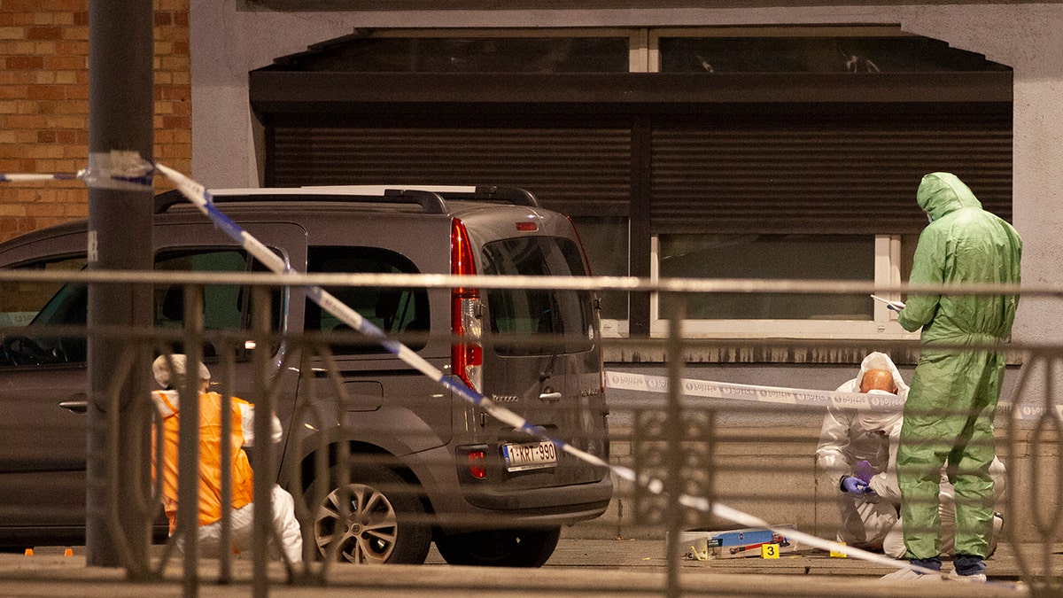 Belgium police killed terror suspect accused in death of 2 soccer fans after hourslong manhunt in Brussels Crime scene, tape