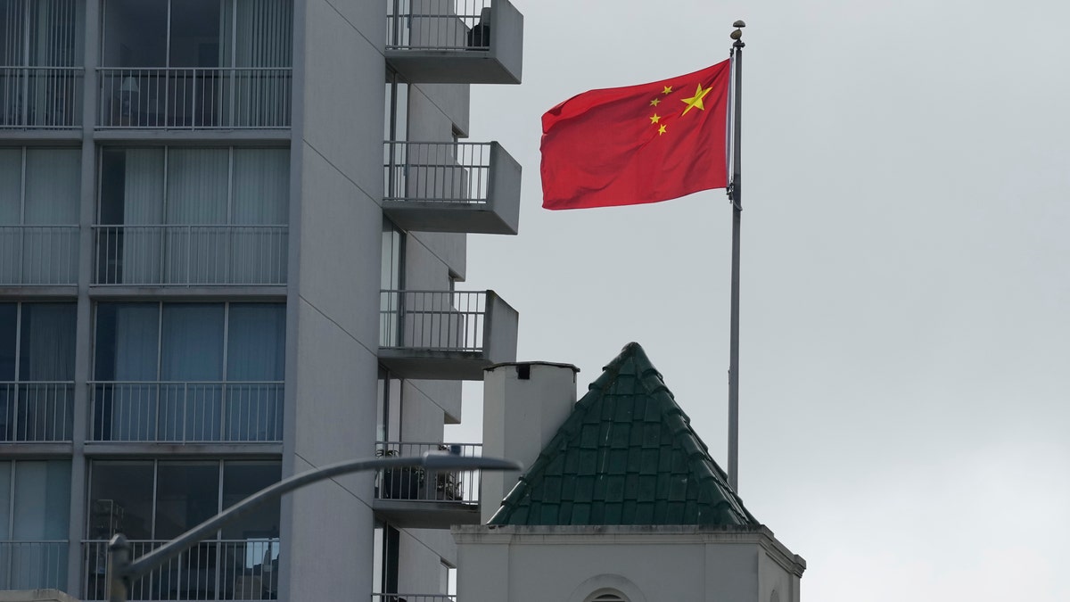 chinese flag near buidling
