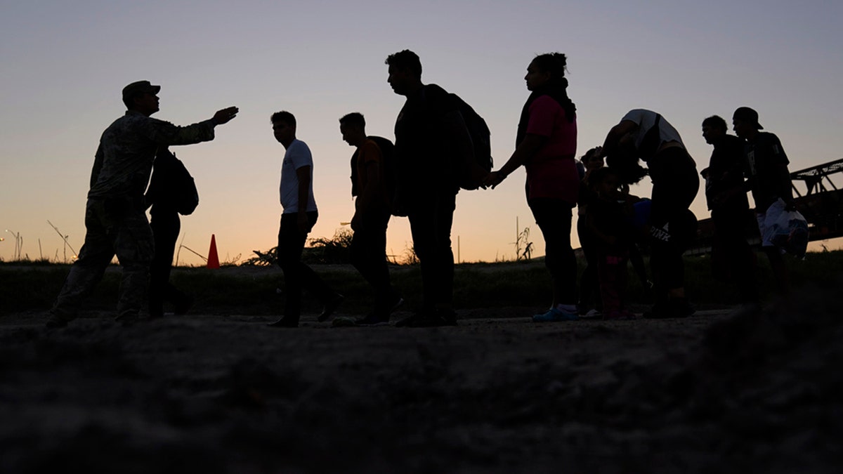 Migrants who crossed the Rio Grande 