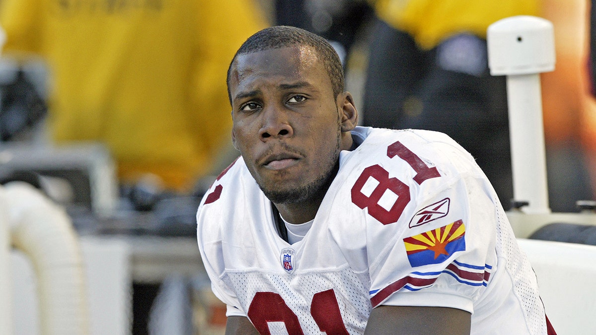 Anquan Boldin looks on field from sideline