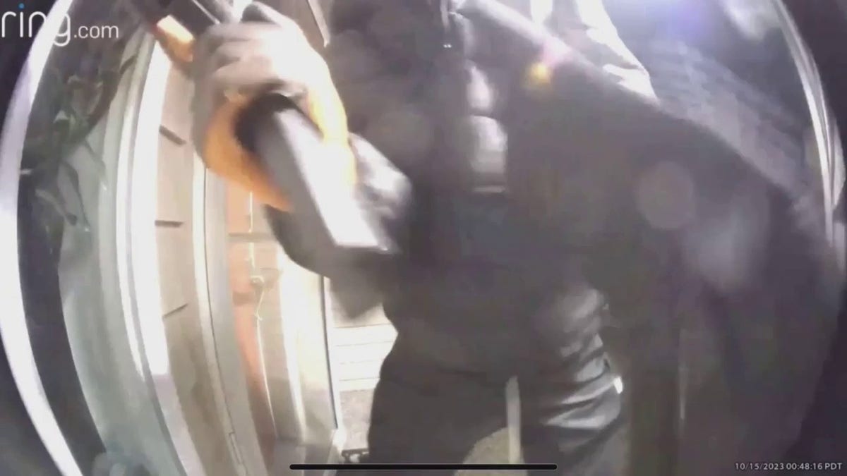 suspect striking doorbell camera