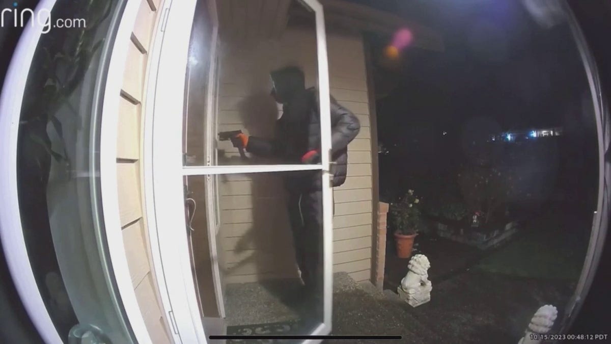 armed suspect outside door