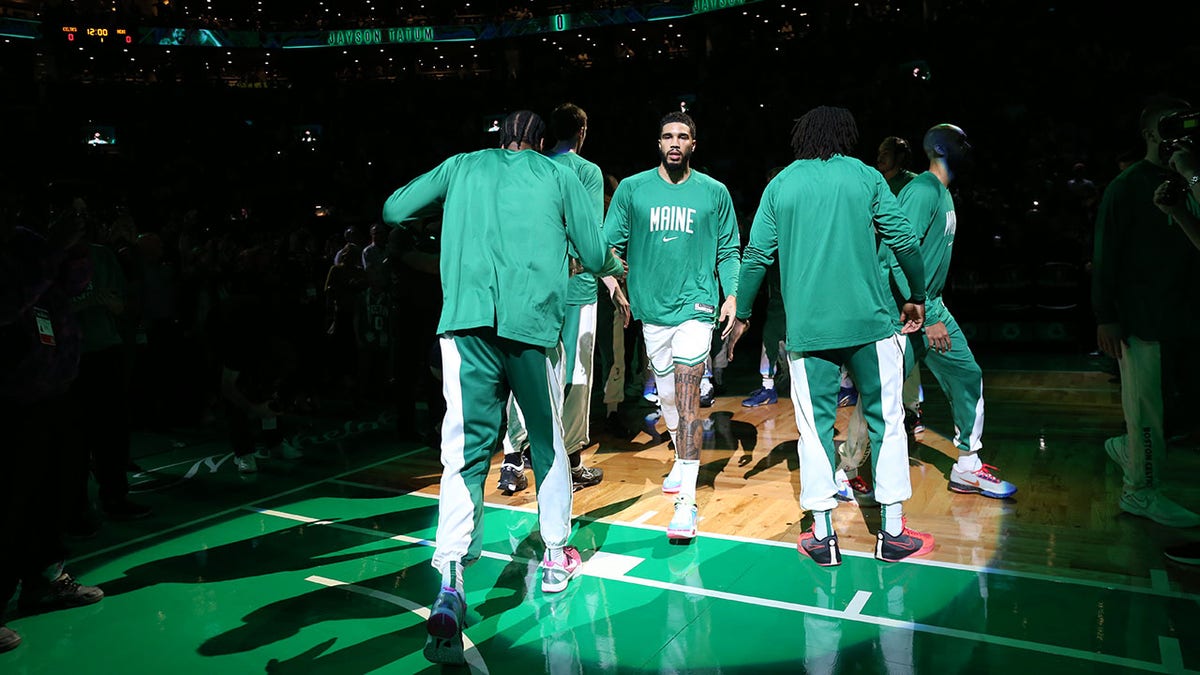 Jayson Tatum is introduced before a game