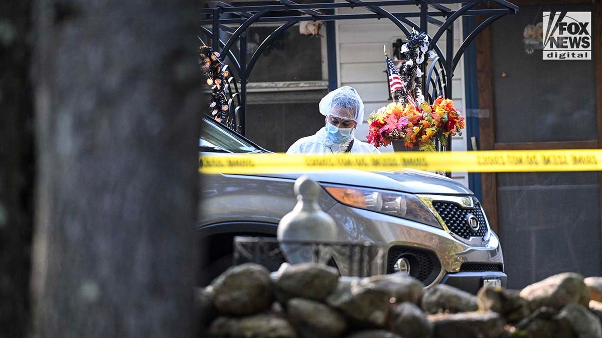 New York State Police collect evidence at the home of Craig Ross Jr.