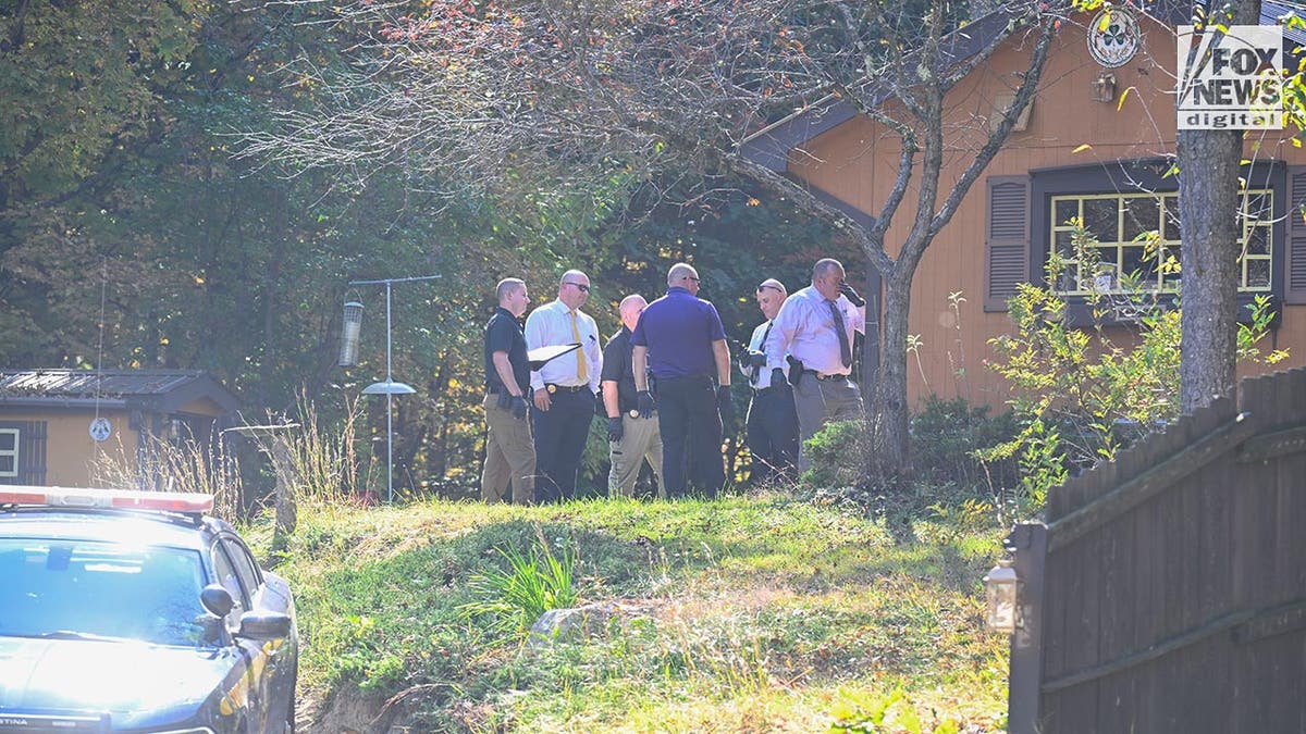 Police outside the home of the The son of the man who allegedly abducted Charlotte Sena