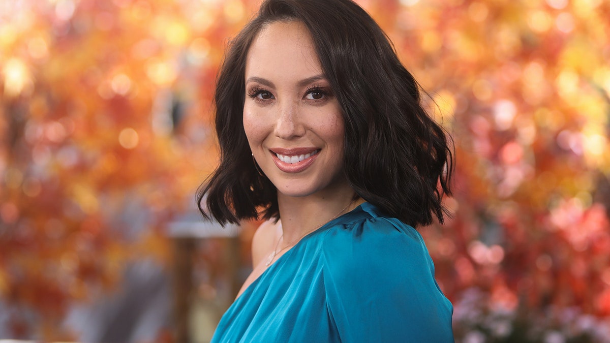 Close up of Cheryl Burke smiling