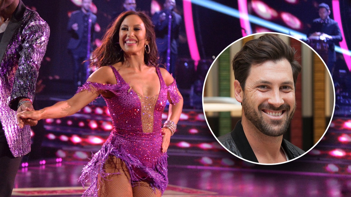 Cheryl Burke dancing and Maks smiling