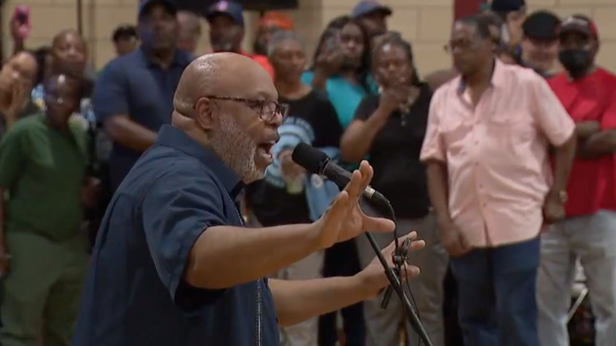 Man speaking at local Chicago rally