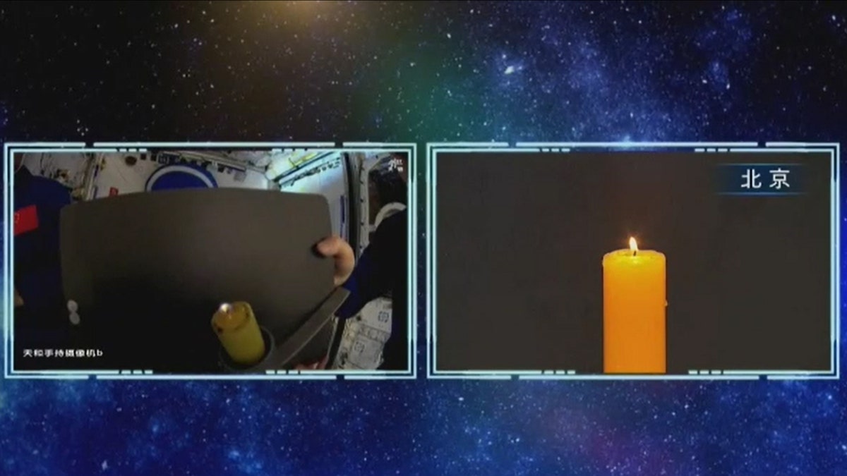 still shots of candle lit aboard Chinese space station