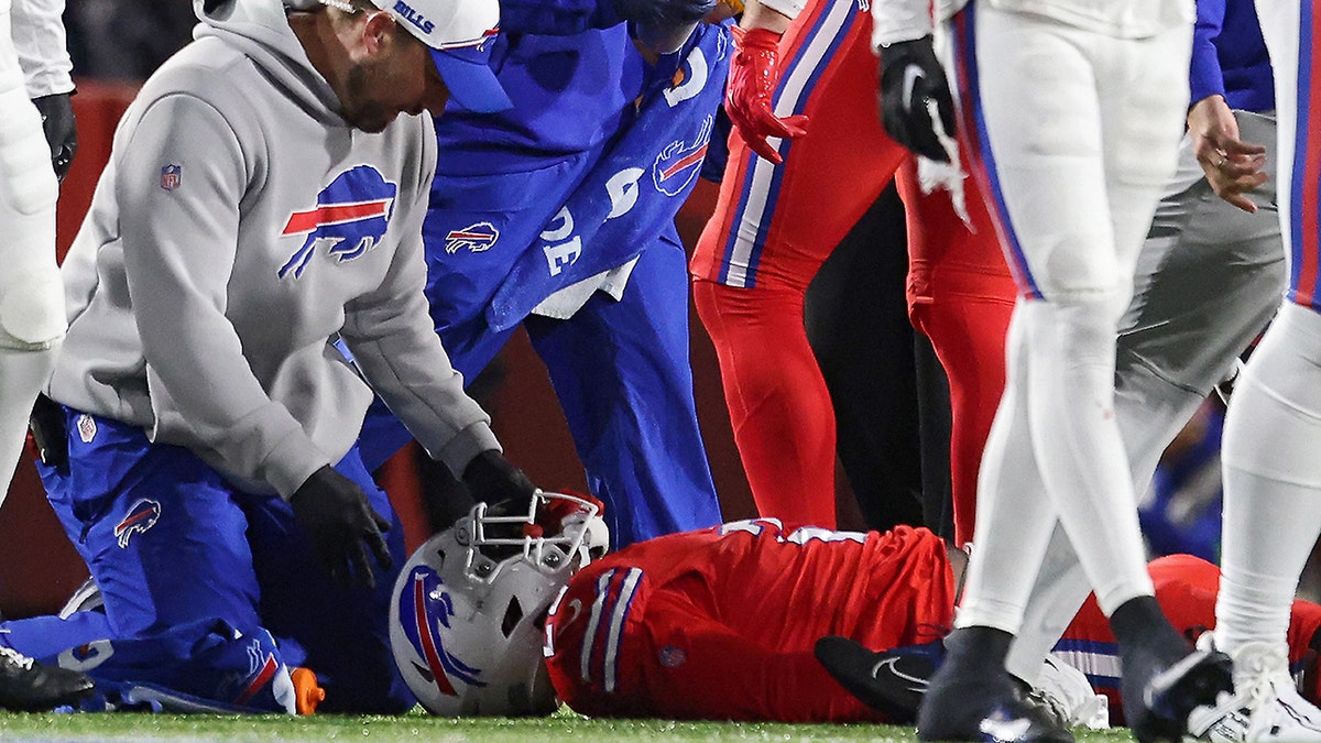 Buffalo Bills running back Damien Harris lays on field