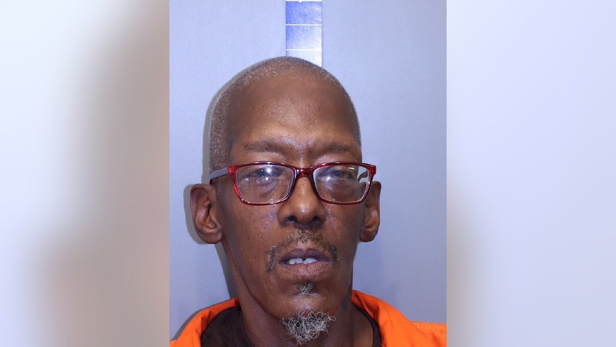 Darryl Roberts pictured wearing glasses in a mugshot