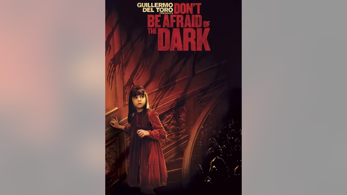 Girl on staircase on movie poster of "Don’t Be Afraid of the Dark"