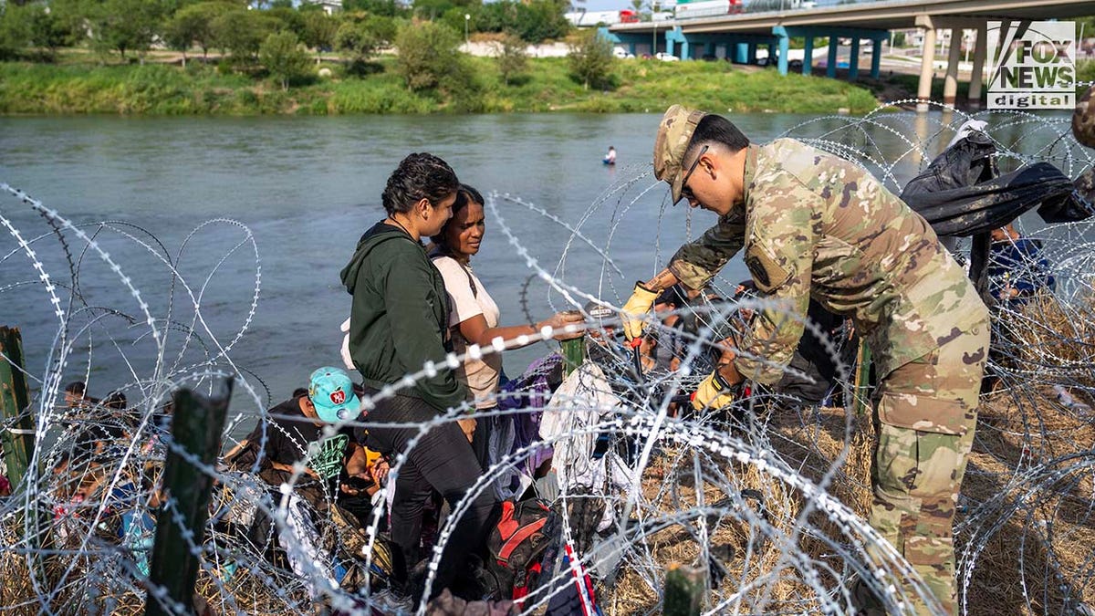 Migrants cross the Rio Grande River to enter the American Border