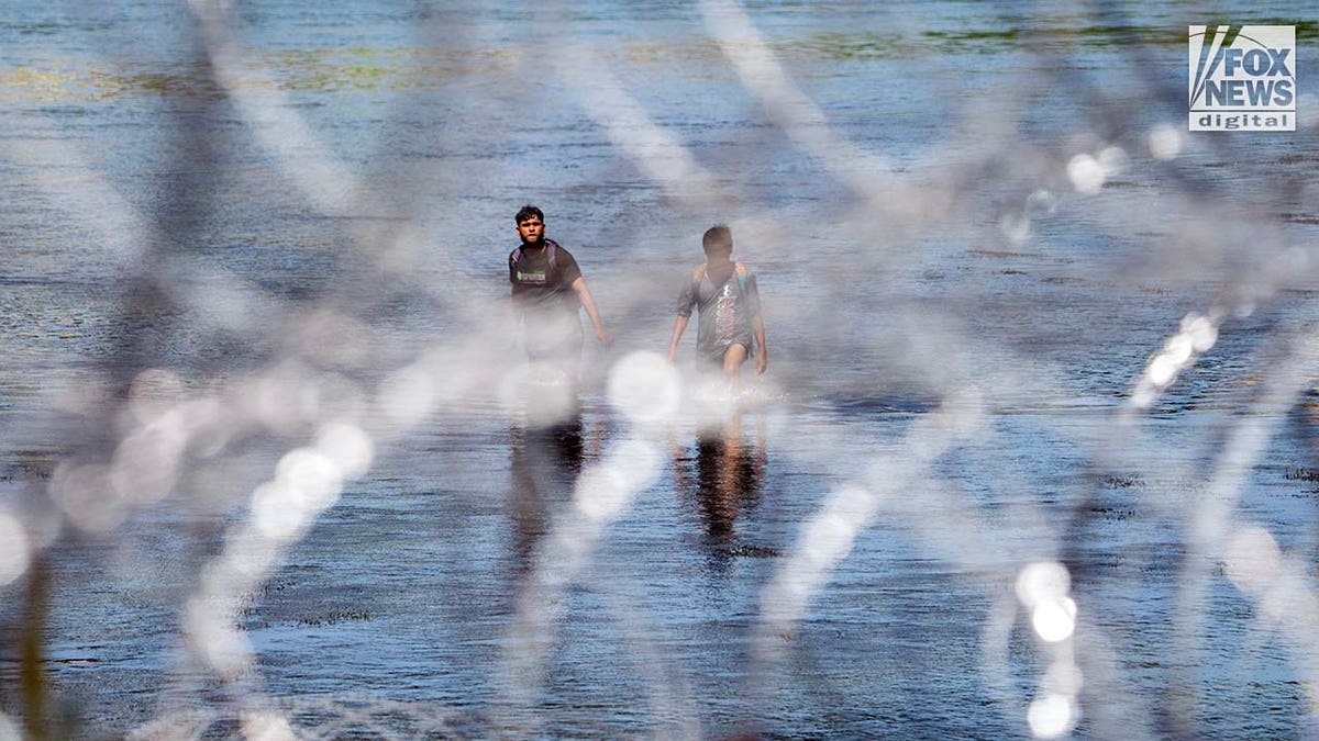 Migrants cross the Rio Grande River to enter the American Border