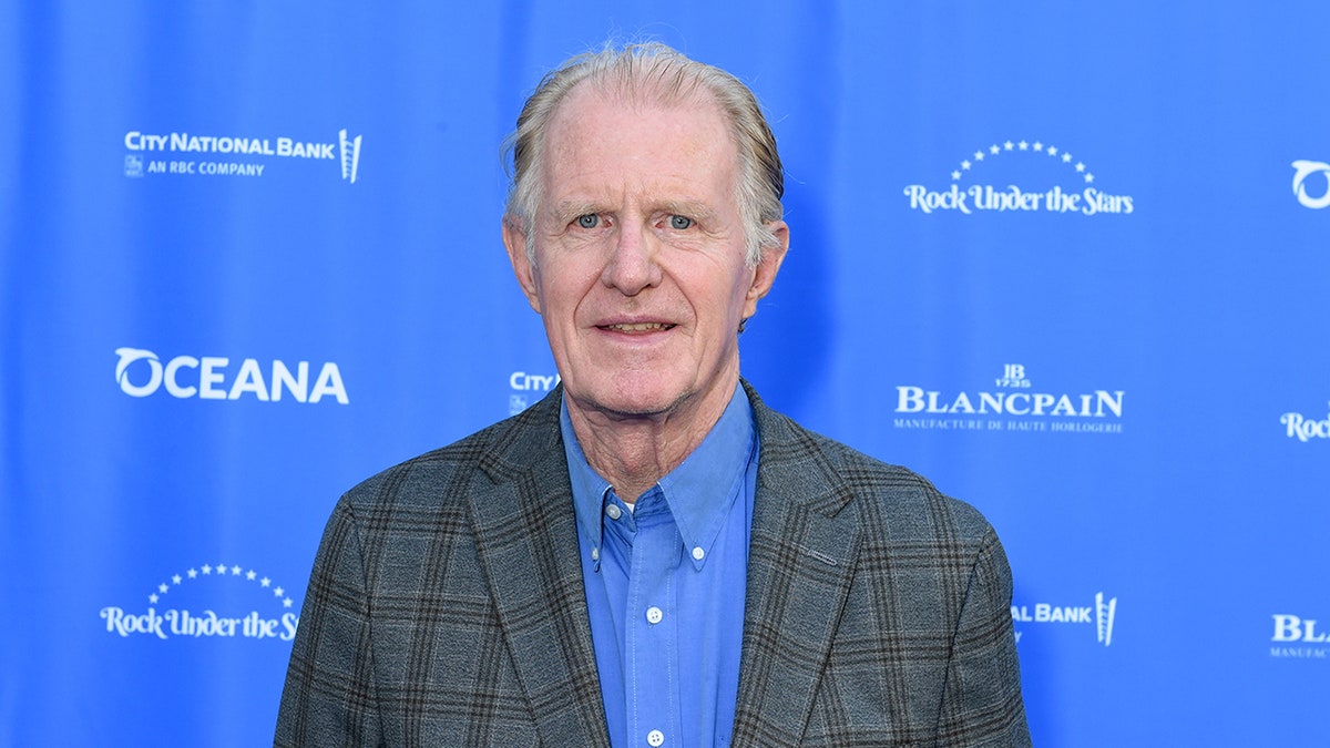 Ed Begley Jr. posing on the red carpet