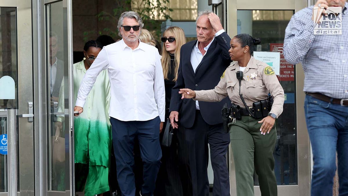 Family and friends of Fraser Bohm exit the Van Nuys West Courthouse