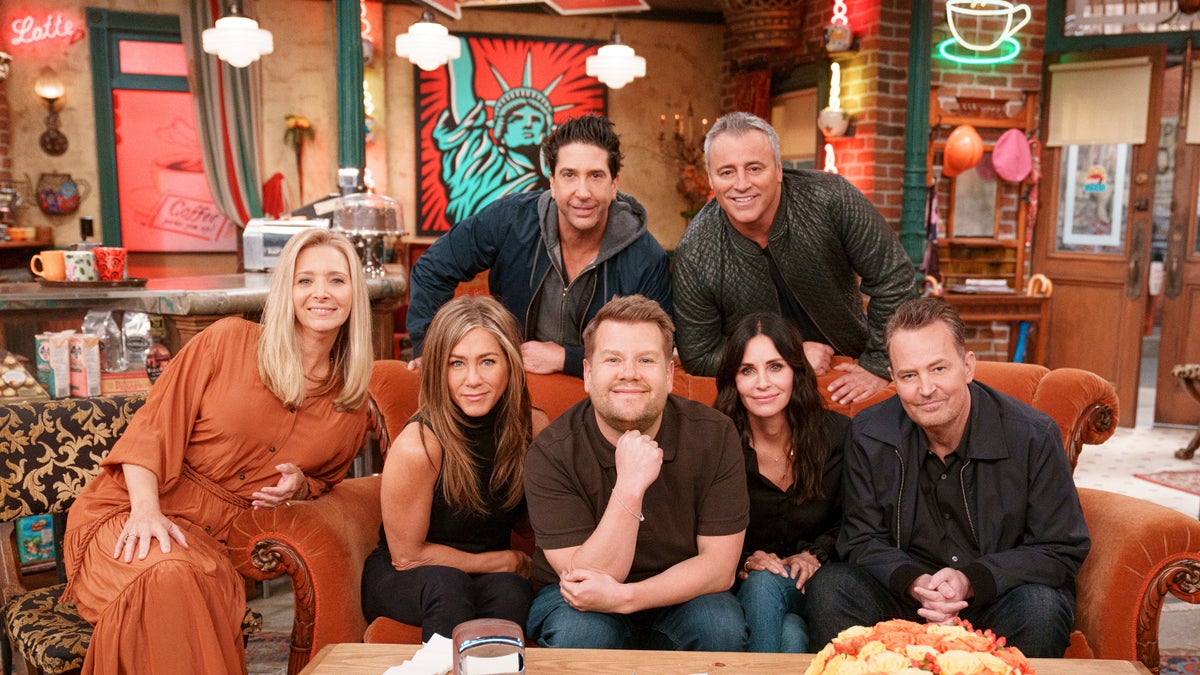 Lisa Kudrow, Jennifer Aniston, Courtney Cox, David Schwimmer, Matt LeBlanc, and Matthew Perry join James Corden for a Friends Reunion Special during The Late Late Show with James Corden. posing together in coffee shop set