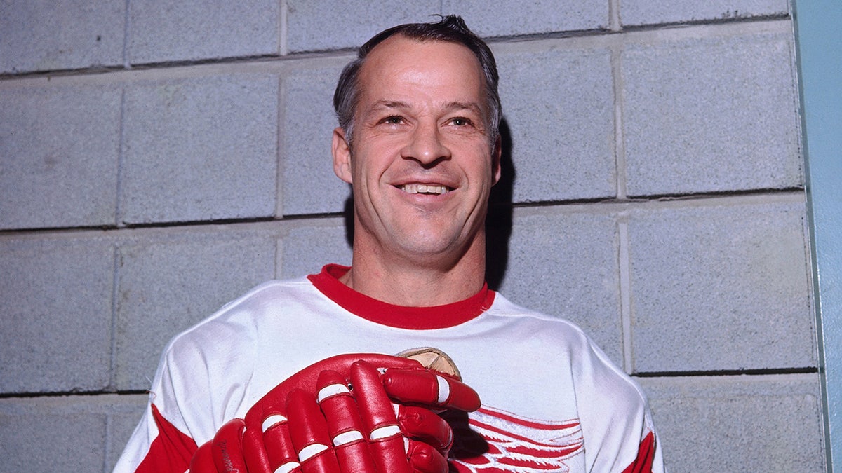 Gordie Howe poses for a picture