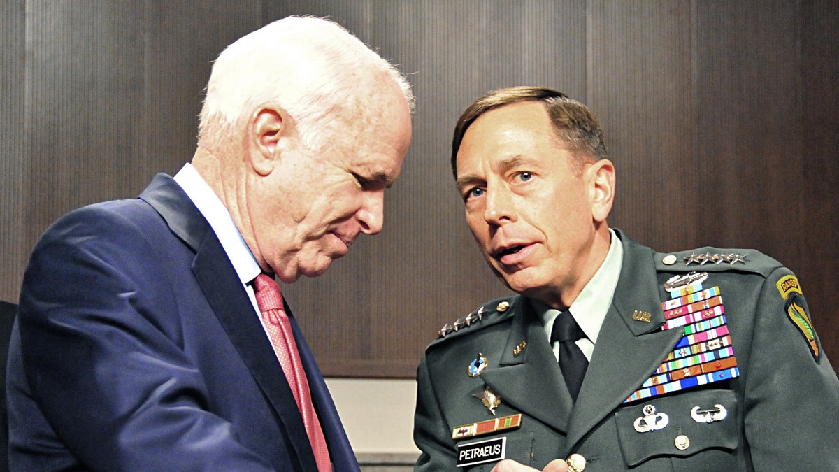 Gen. Petraeus speaks with Sen. McCain