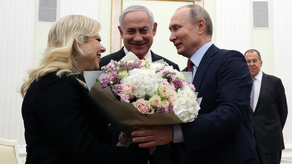 Putin meets the Netanyahus