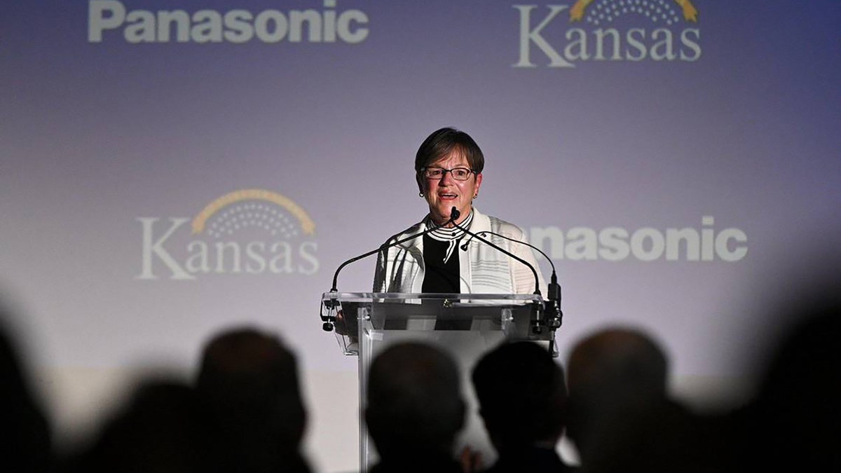 Kansas Gov. Laura Kelly on stage announcing details of $4 billion Panasonic EV battery plant in de soto