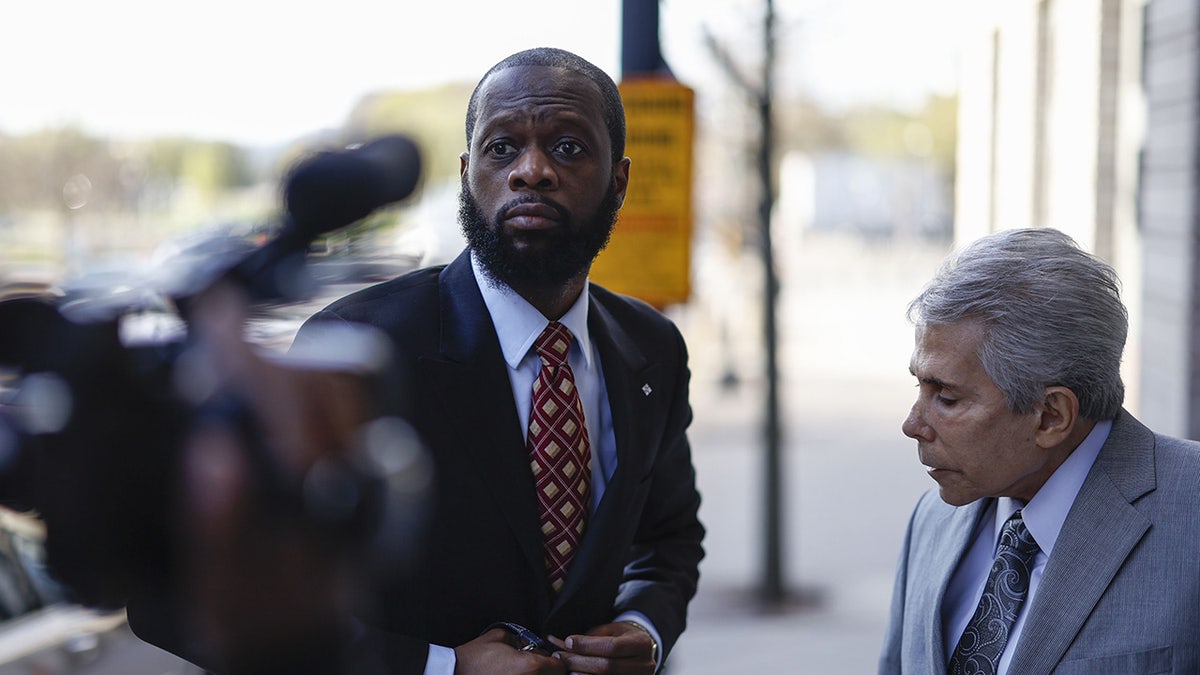 Pras Michel heads to trial with his lawyer