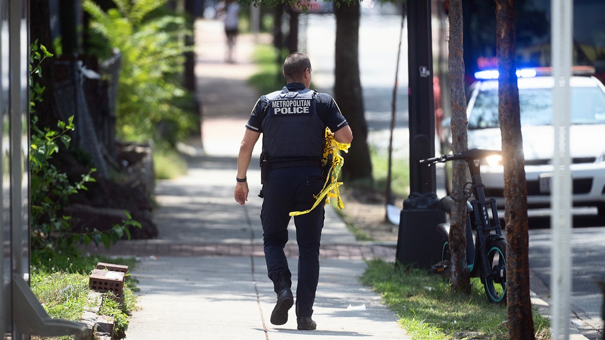 DC police officer carried crime scene tape