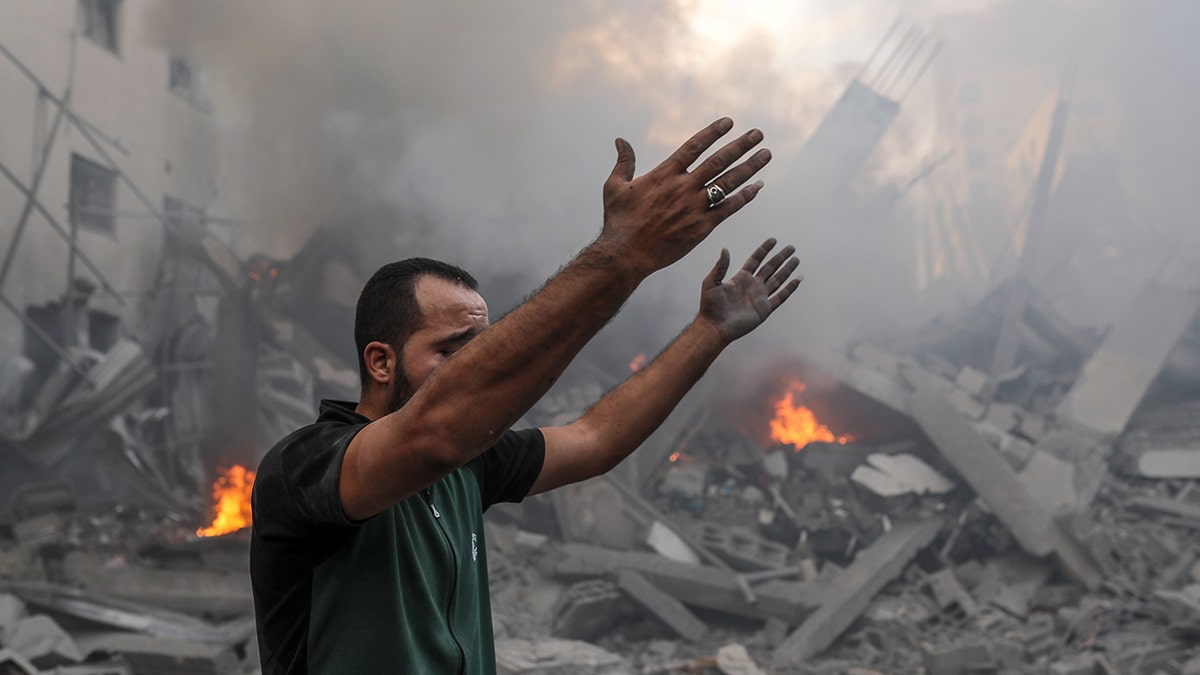 Man pinch arms raised successful Gaza