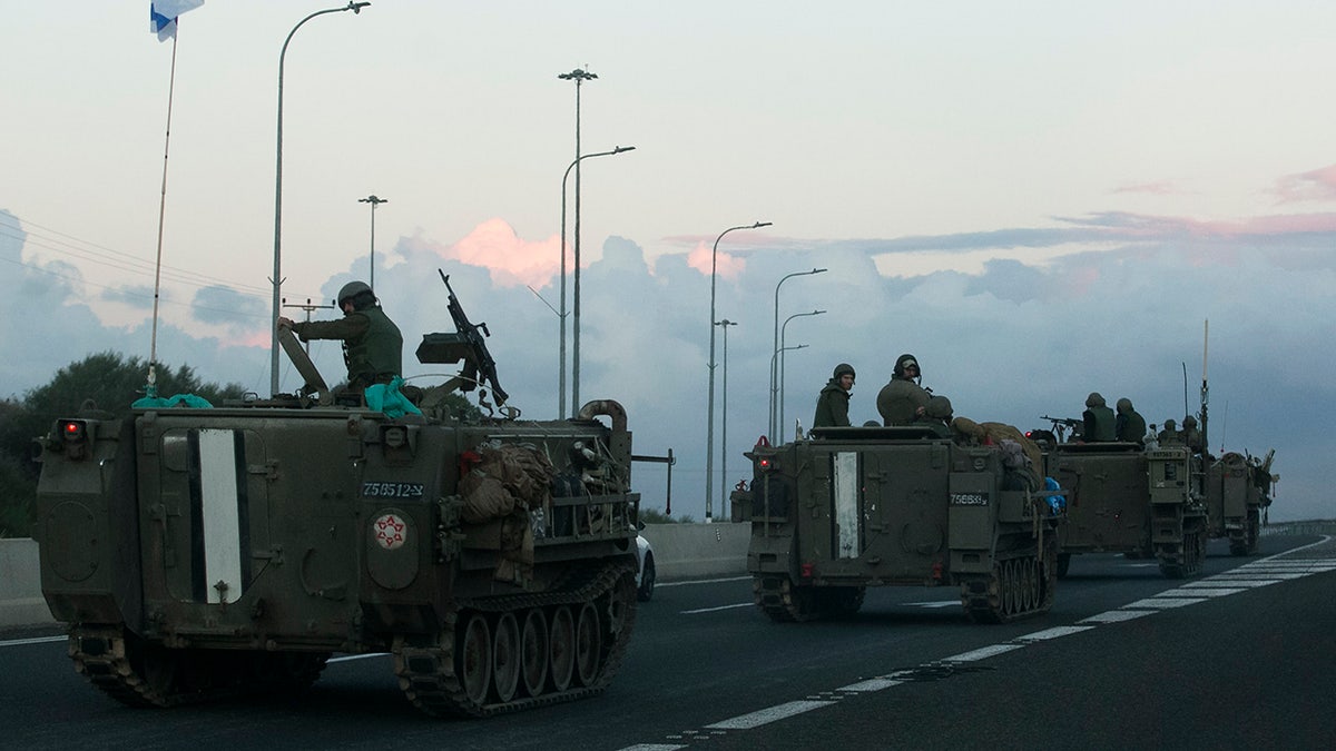 Israeli APCs on road near border with Lebanon