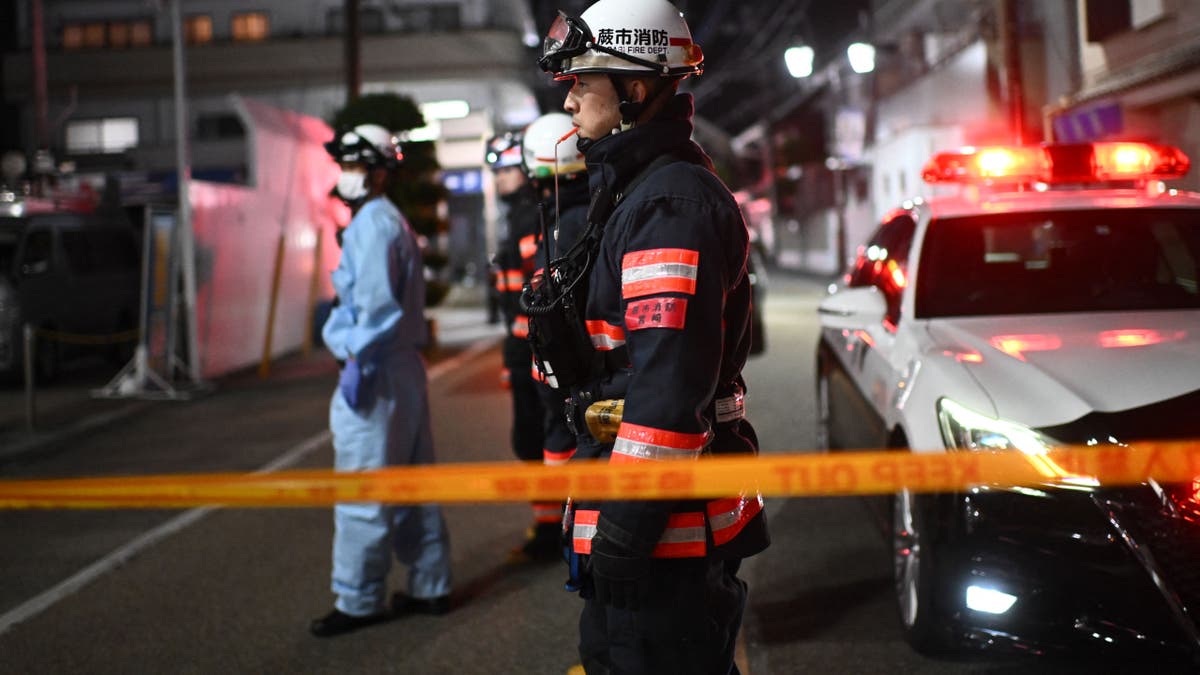 Japanese police outside a post office