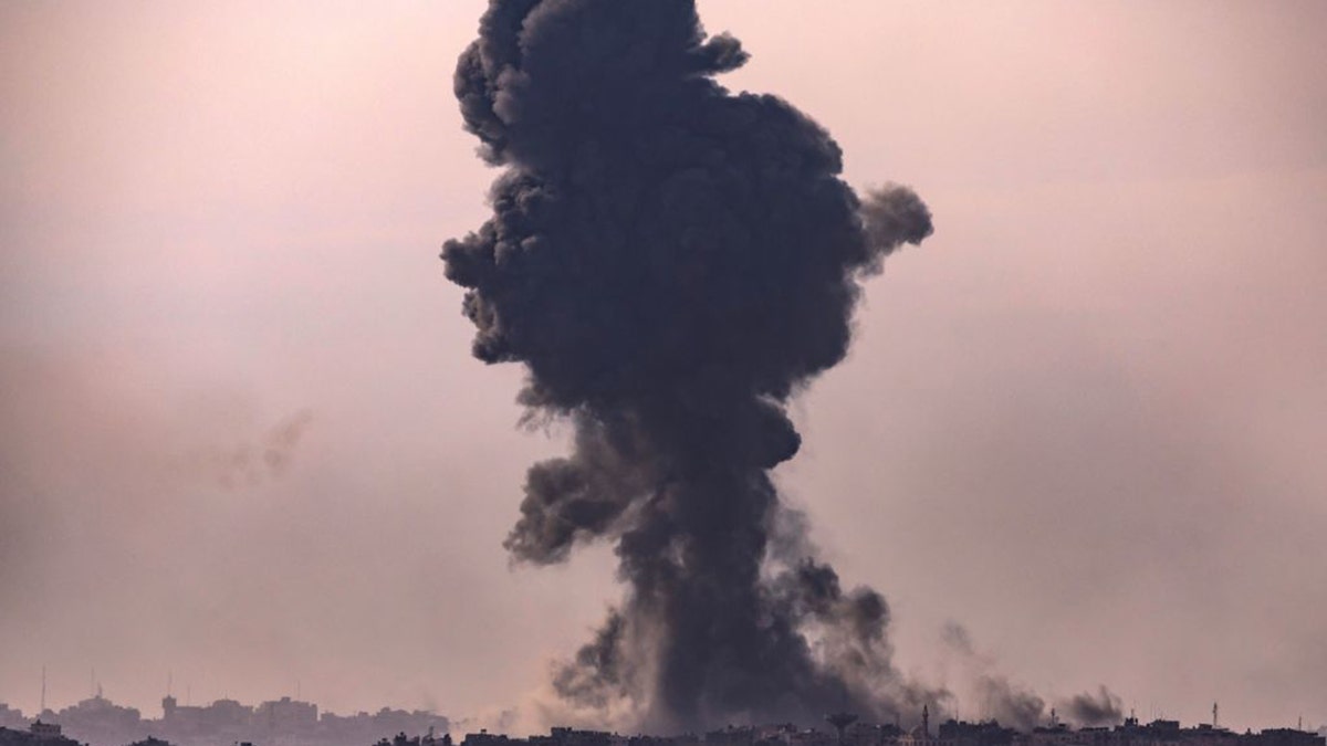 smoke rising over gaza