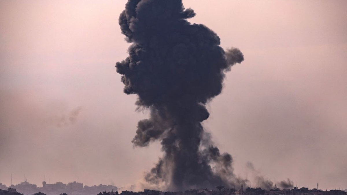 smoke rising over gaza