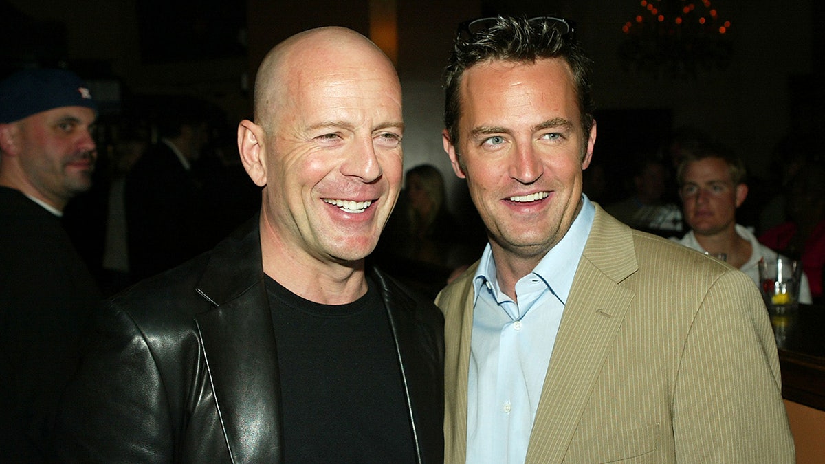 A photo of Bruce Willis and Matthew Perry