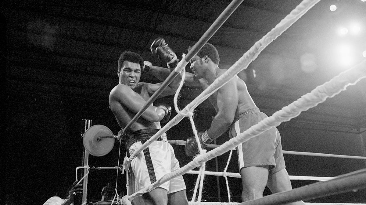 Muhammad Ali doing the "rope a dope" strategy