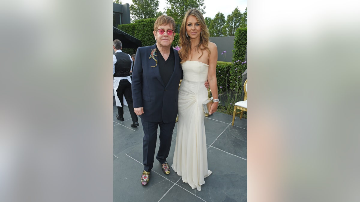 Elton John and Elizabeth Hurley