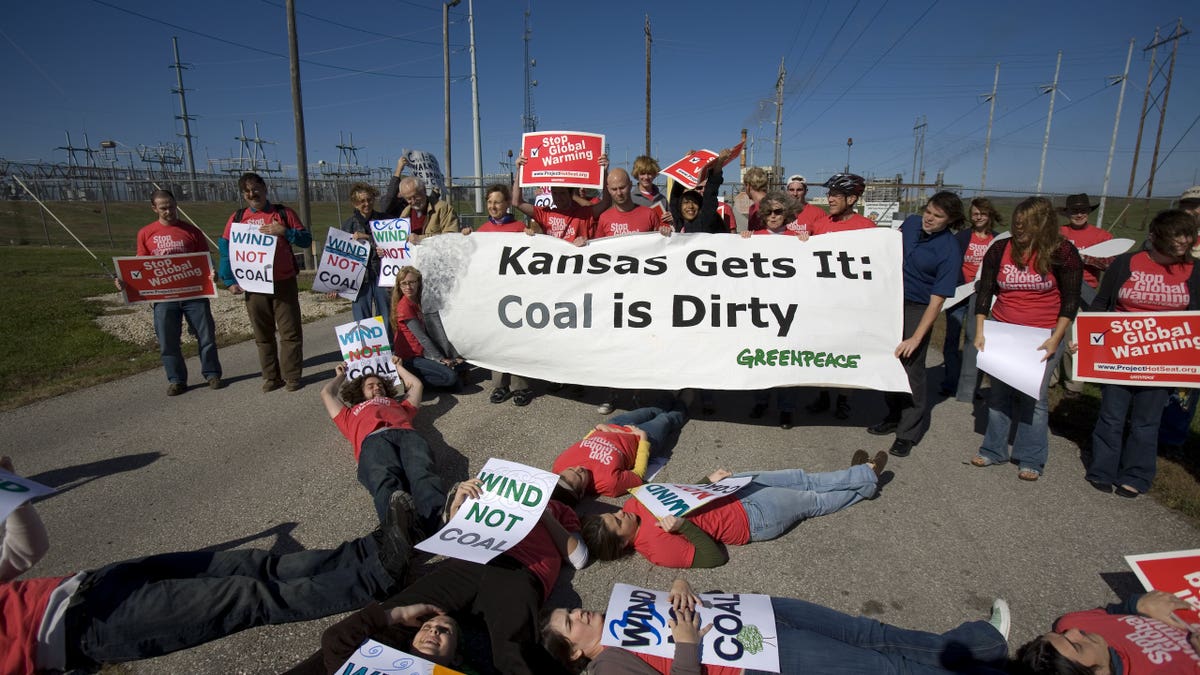 Kansans gathered outside Lawrence energy center to protest coal power