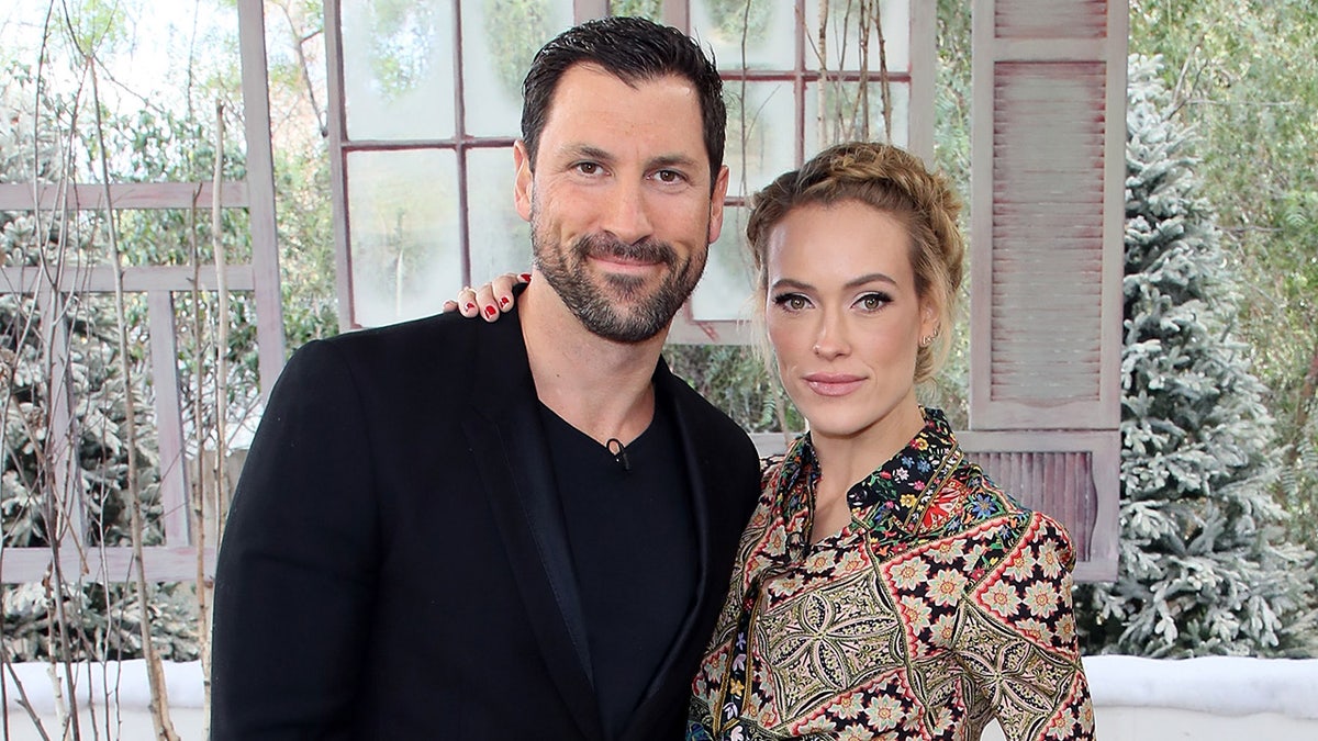 Maksim Chmerkovskiy and Peta Murgatroyd smiling