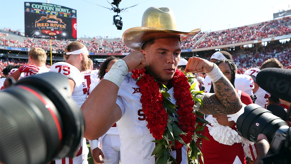 Quarterback Dillon Gabriel celebrates a win