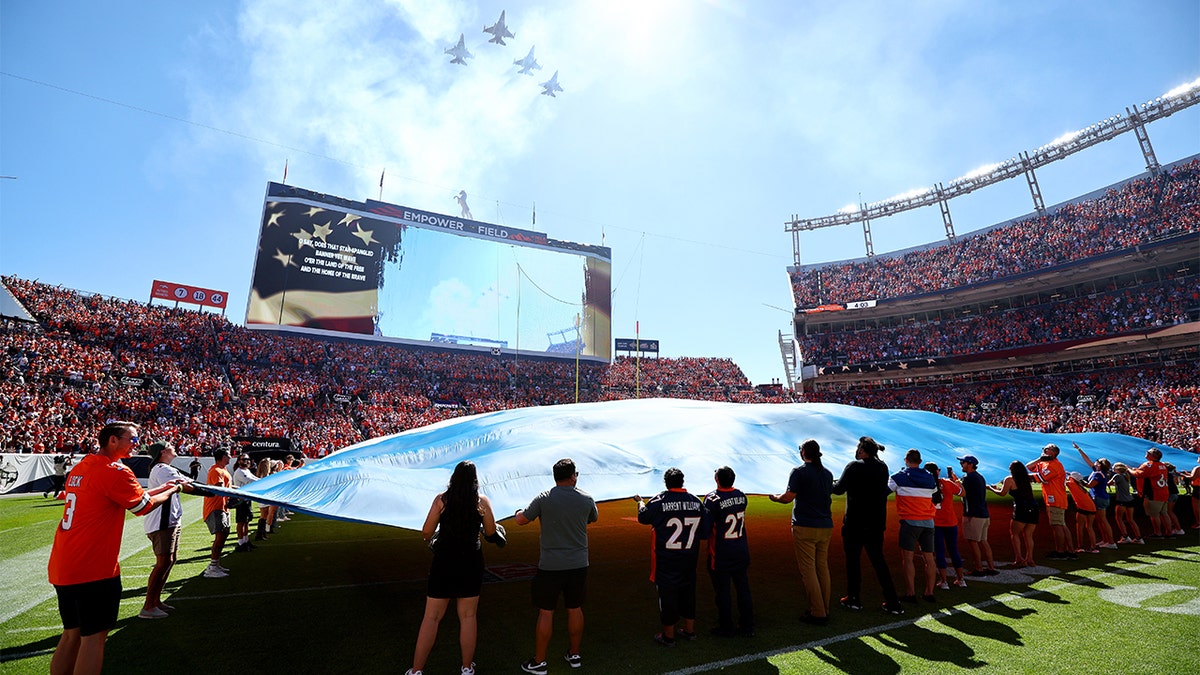 Jets fly over Empower Field