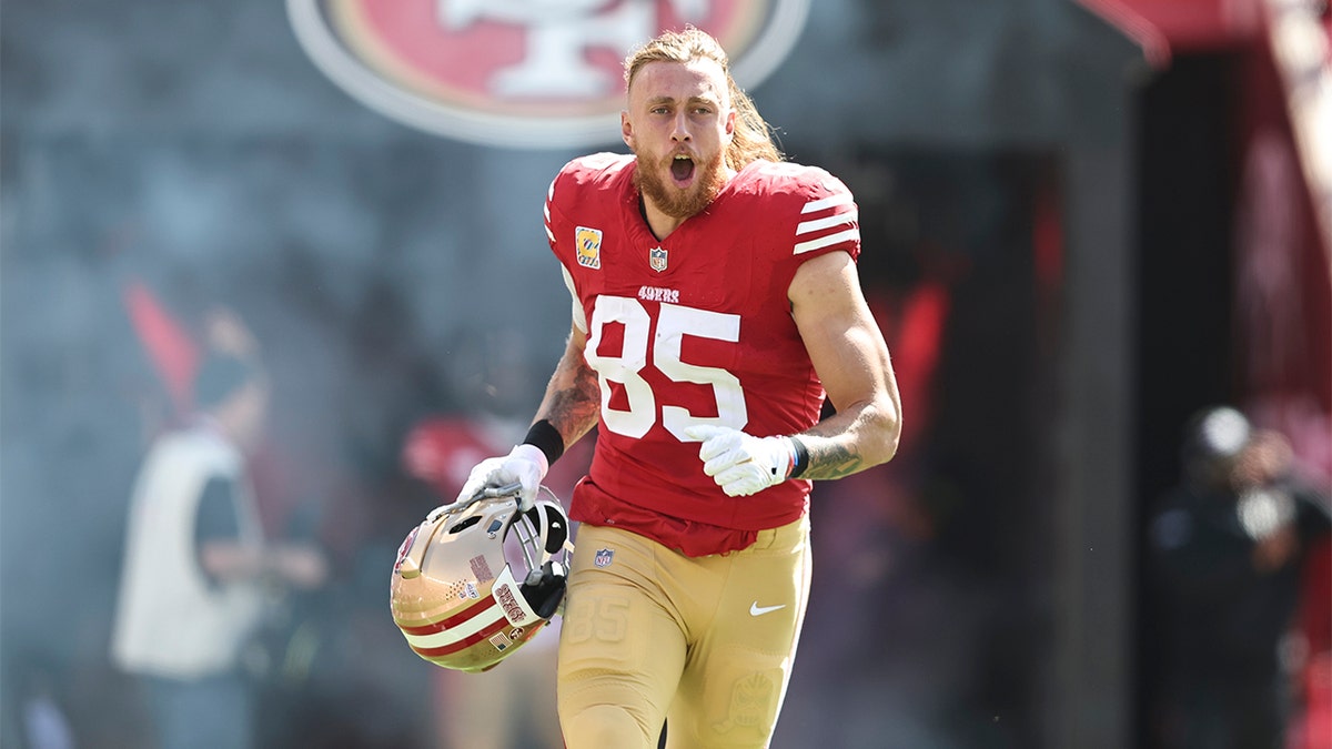 George Kittle takes the field