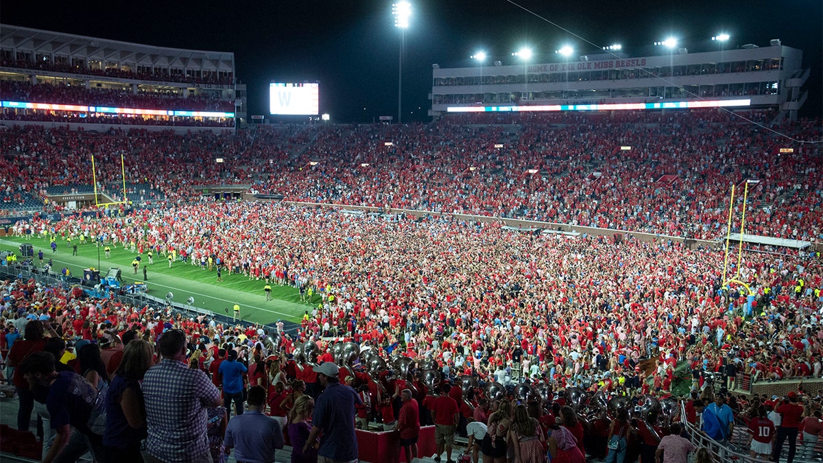 Ole Miss fans storm the field