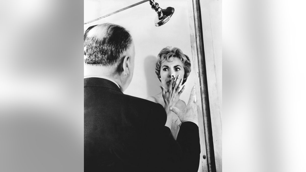 Alfred Hitchcock directing Janet Leigh in the shower