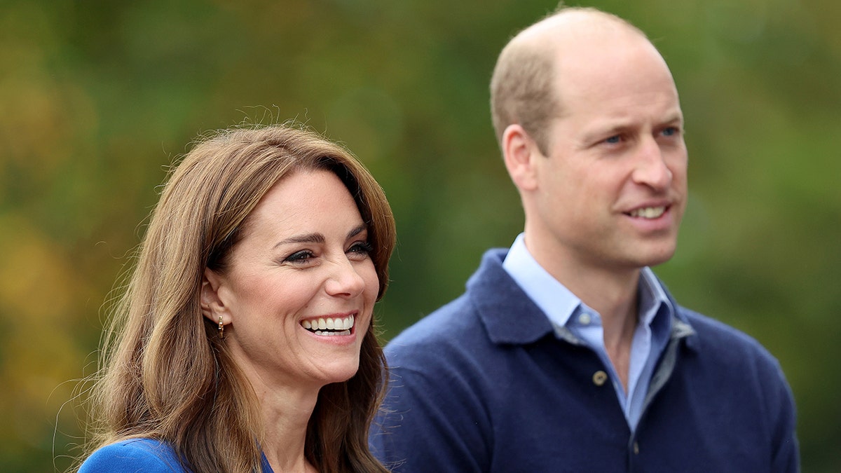 Prince William and Kate Middleton wearing matching shades of blue during an outing