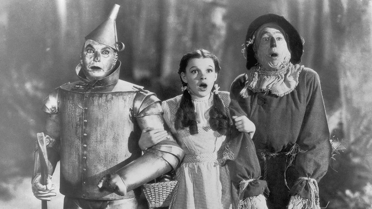 A scene from The Wizard of Oz featuring Judy Garland in costume as Dorothy