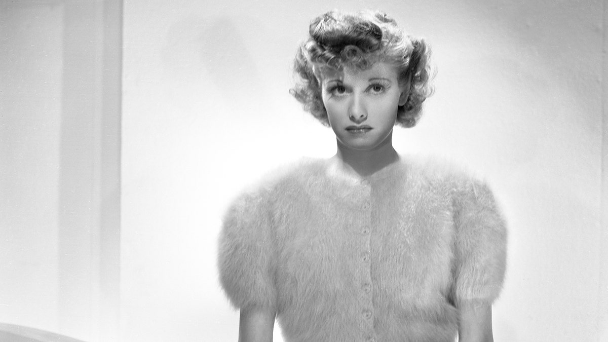 A young Lucille Ball in a fur white coat