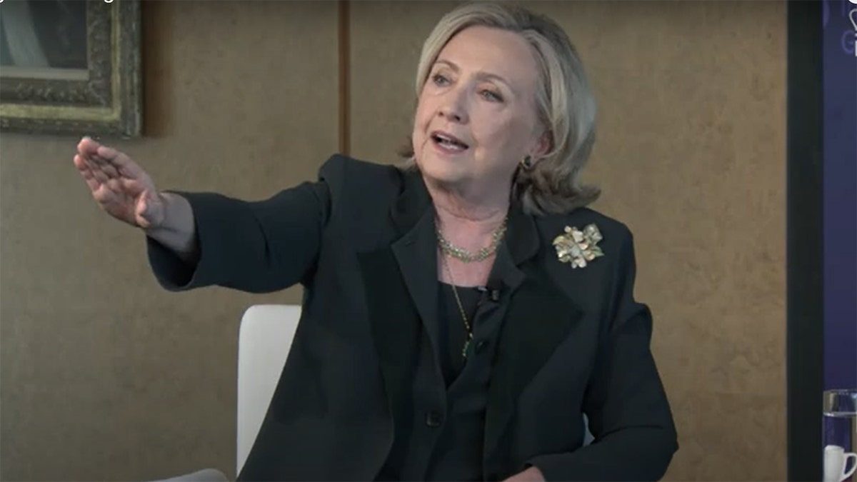 Hillary Clinton gesturing a heckler