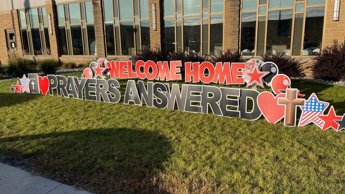 Welcome home sign at Holy Cross Church