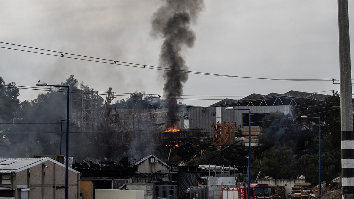 A building a fire after Hamas launched rockets into Israel.