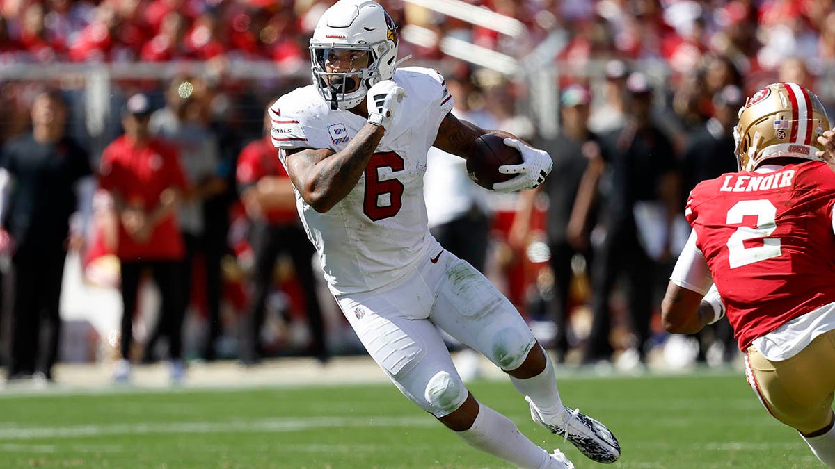 Cardinals' James Conner gets into a scuffle with 49ers' Talanoa Hufanga  after the game